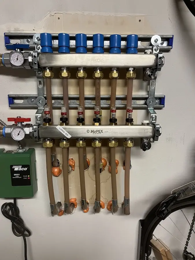 Plumber performing Water Heater Repair at a residential property in Cedar Creek